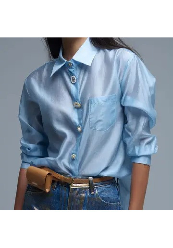 camisa suelta azul sedosa